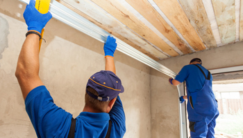 Garage-doors-installation.-Workers-installing